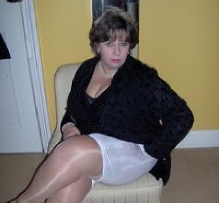 Elegant mature shows her silky directoire knickers