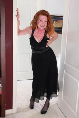 Tami E- the classy busty redhead lingerie and heels granny!