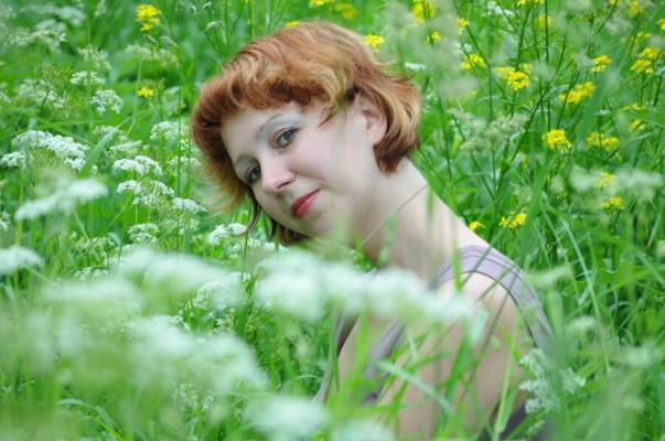 Red hair mature posing