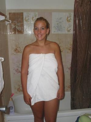 Blonde wife in the bathtub