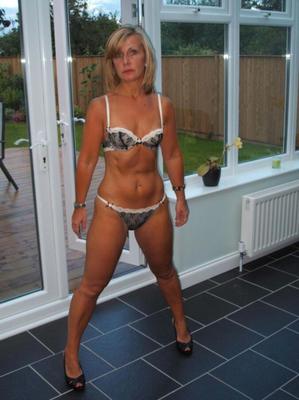 Mature Blonde Showing Off The Goods