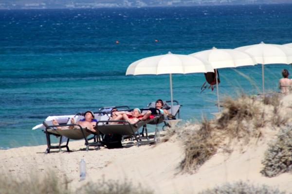 Mature babe caught topless in Plaka beach, Naxos