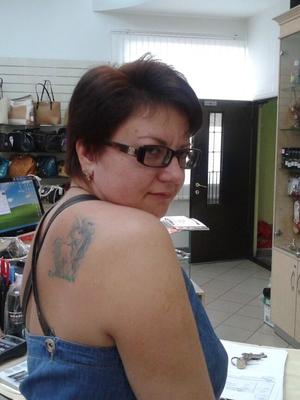 Mature Irina from Moscow with rose tatoo on her tit