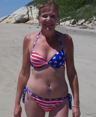 MILF , her daughters , and her friend in Bikinis at beach