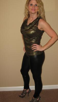 Hot blond MILF showing off her ass in liquid leather leggings