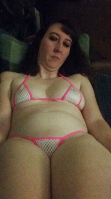 Subdued Submissive wife in Micro Bikini.