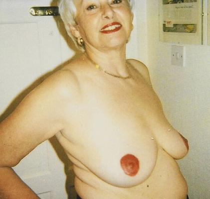 "H" with red lipstick painted nipples and areolas