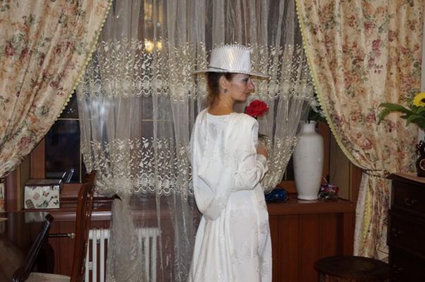 In Wedding Dress and White Hat