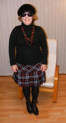 Chubby wife in short tartan skirt and shiny tights