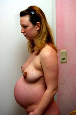 Corps de femme enceinte