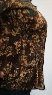 Candid Cougar in camouflage blouse big tits